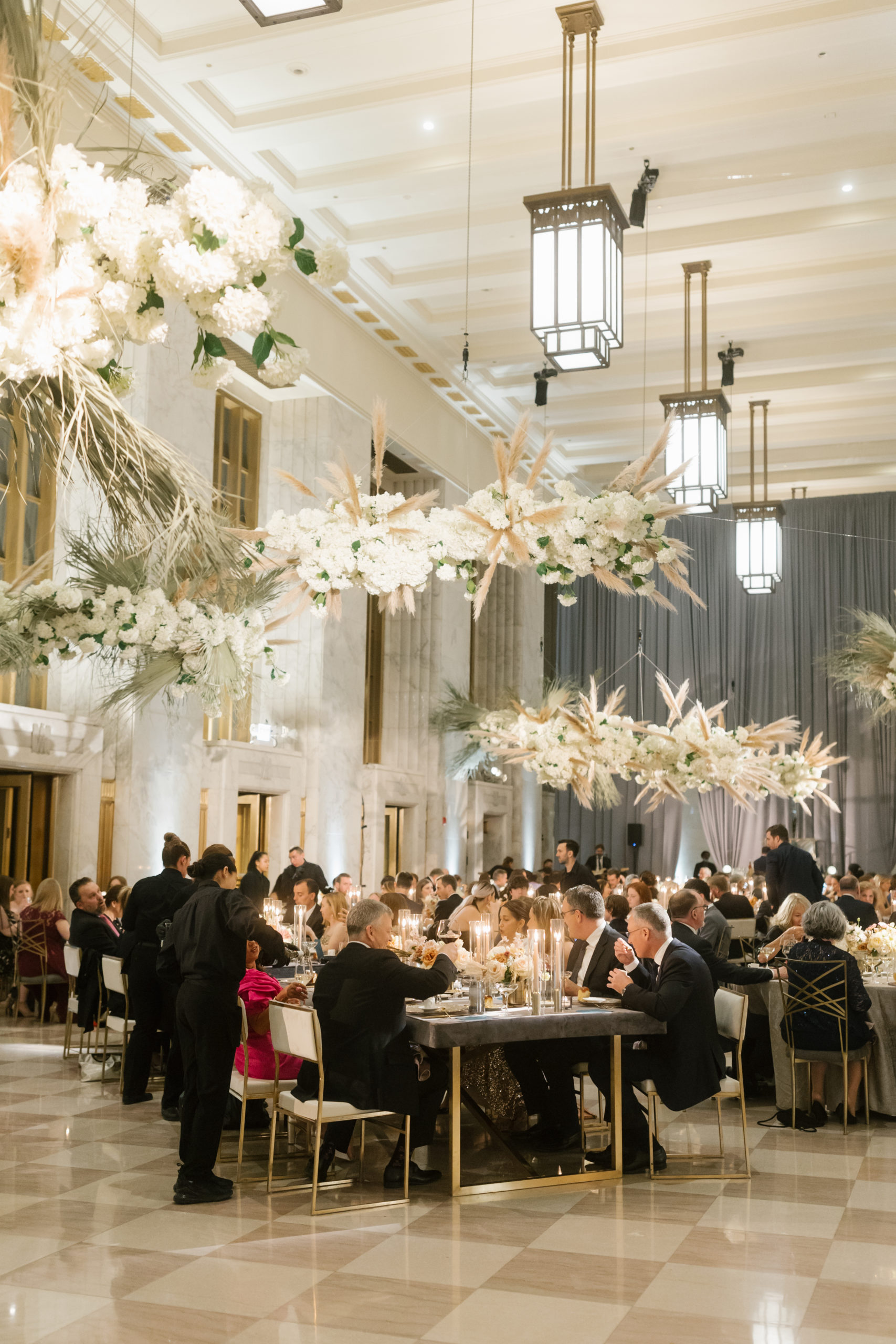 Black Tie Wedding at The Old Post Office with hanging floral installations
